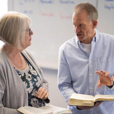 Dr. Wes Olmstead helping a college student